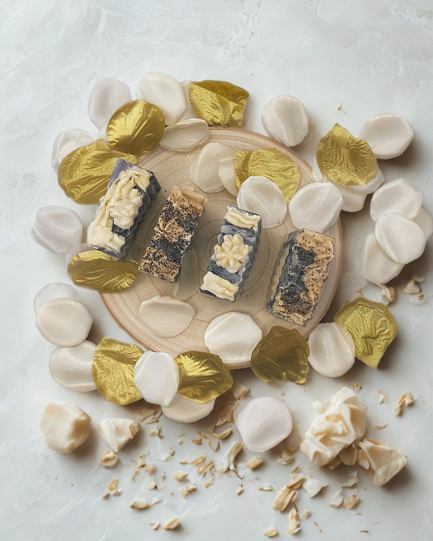 Aetheria Glow handcrafted soap bar with olive oil, activated charcoal, and vanilla essential oil, placed on a rustic wooden dish for an authentic ancient Greek skincare experience