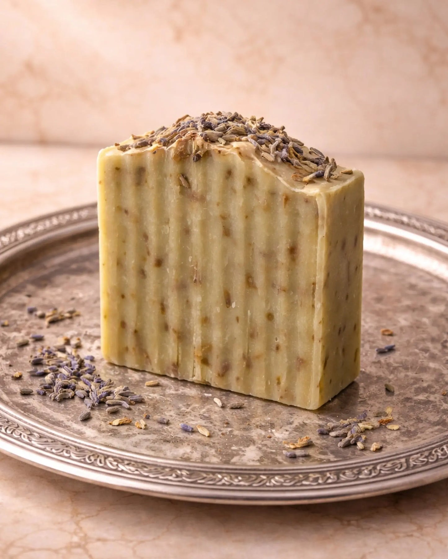 Thera Serenity lavender and basil soap bar displayed on a decorative silver tray