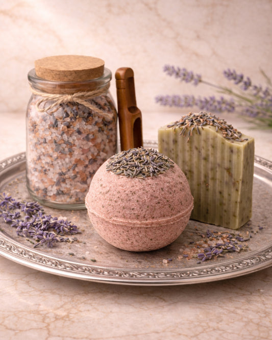Luxury lavender bath gift set with Thera Serenity soap, Nardus lavender bath bomb, and Nardus Hemera mineral bath soak arranged on a silver tray
