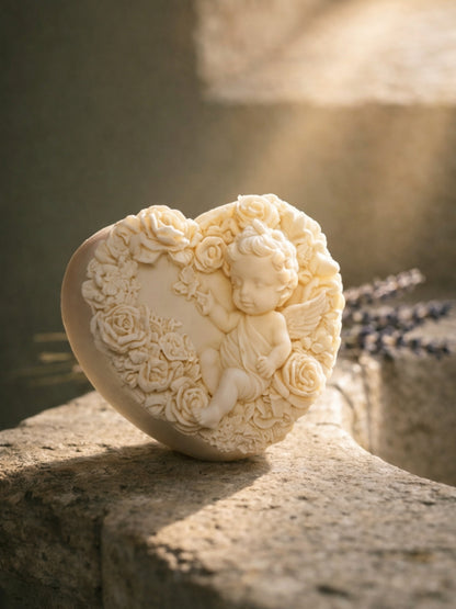 heart-shaped soap with angel and floral design on a stone surface by deosco - the eros angel nardus bliss soap by DEOS CO
The Eros Angel — Pure Olive Oil & Lavender Soap | Nardus Bliss Collection