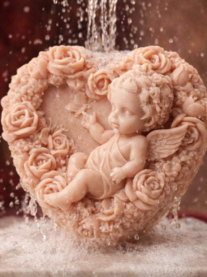 Eros Angel sculpted heart soap under running water, highlighting natural texture and romantic Valentine’s Day mood.