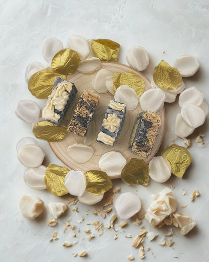 Aetheria Glow handcrafted soap bar with olive oil, activated charcoal, and vanilla essential oil, placed on a rustic wooden dish for an authentic ancient Greek skincare experience
