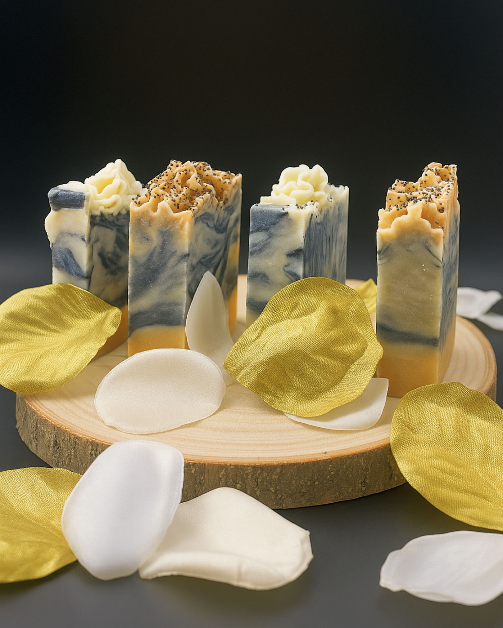 Handmade charcoal soap bars with natural ingredients on a wooden stand with flower petals by DEOS CO | Aetheria Glow