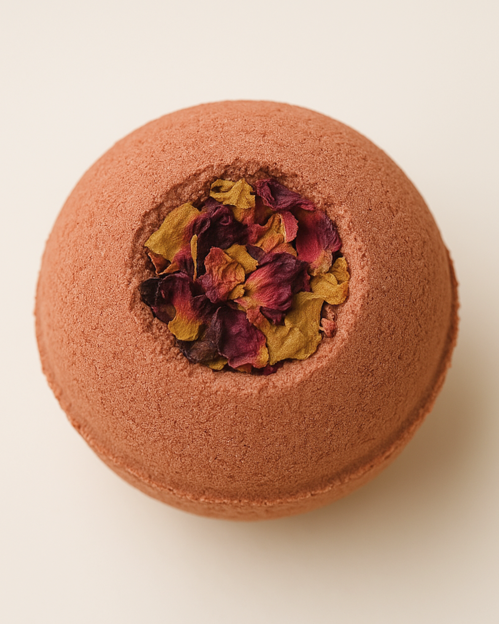 Luxury Aphrodite's Sphere rose bath bomb infused with organic Damask rose petals and natural botanicals — handcrafted by DEOS Co. for soft, hydrated skin.