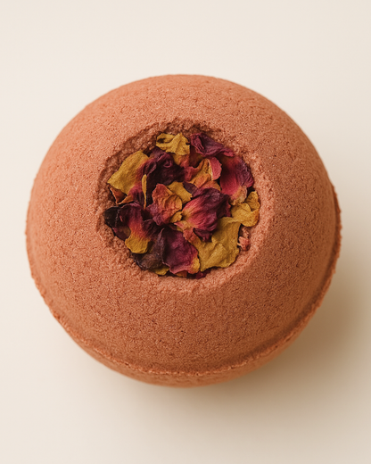 Luxury Aphrodite's Sphere rose bath bomb infused with organic Damask rose petals and natural botanicals — handcrafted by DEOS Co. for soft, hydrated skin.