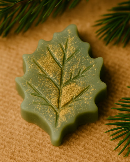 Luxurious Elysian Leaf handmade Christmas soap with gold shimmer — infused with pure pine and orange essential oils, inspired by ancient Greek botanicals for a naturally elegant skincare experience.