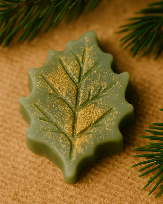Luxurious Elysian Leaf handmade Christmas soap with gold shimmer — infused with pure pine and orange essential oils, inspired by ancient Greek botanicals for a naturally elegant skincare experience.
