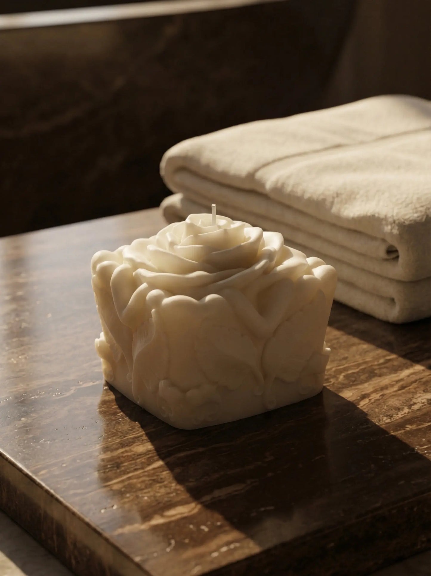 Modern sculptural soy candle with warm vanilla aroma