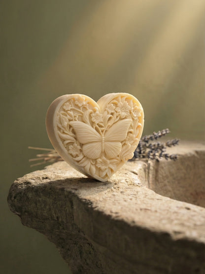 KARDIÁ butterfly heart olive oil soap by DEOS CO. resting on natural stone with lavender, Nardus Bliss Collection