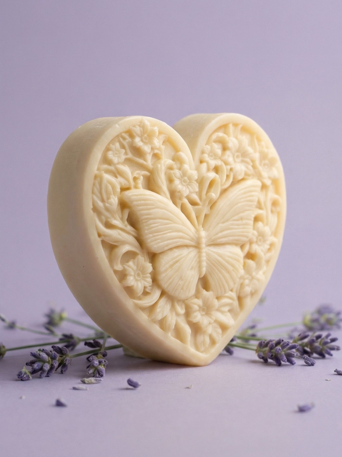 KARDIÁ butterfly heart lavender olive oil soap by DEOS CO. with floating lavender on stone pedestal