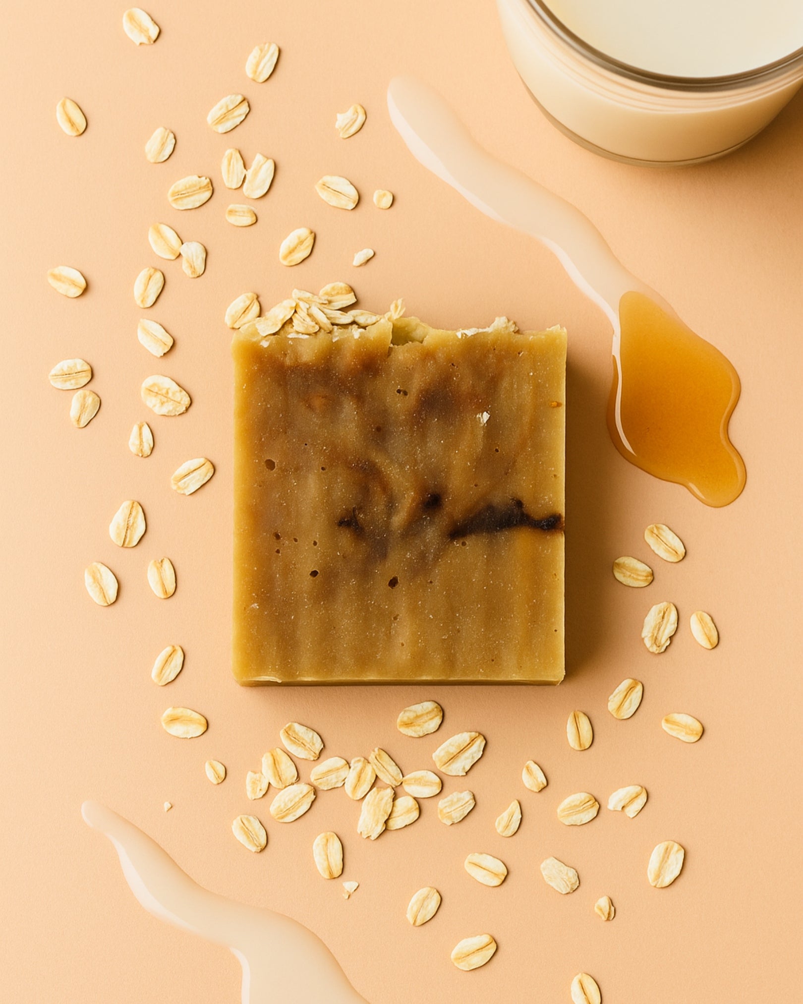 Bar of Melia Therion soap by Deos Co with honey and oats on a beige background