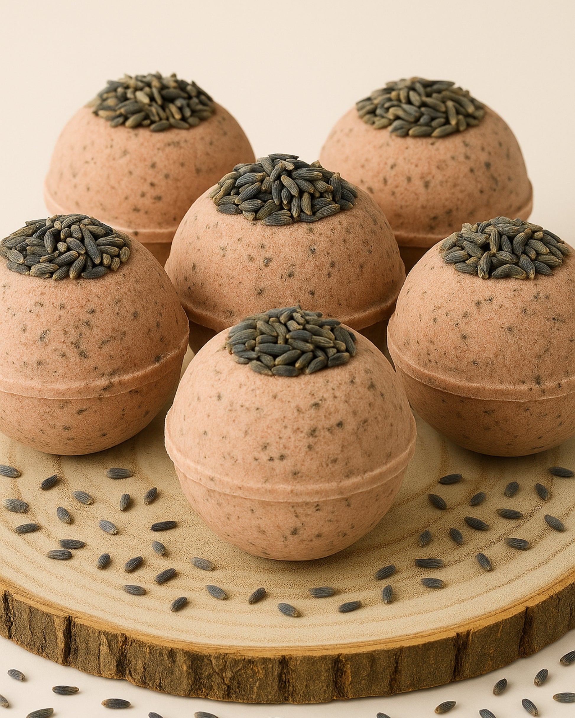 Nardus Sphere 6-pack Bath bombs set with seed toppings on a wooden surface by DEOS Co.