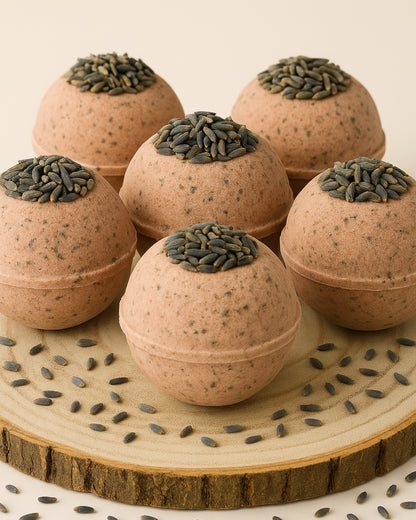 Nardus Sphere 6-pack Bath bombs set with seed toppings on a wooden surface by DEOS Co.