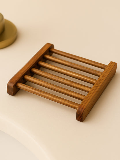DEOS Co.'s Natural Wooden soap holder dish on a beige bathroom surface