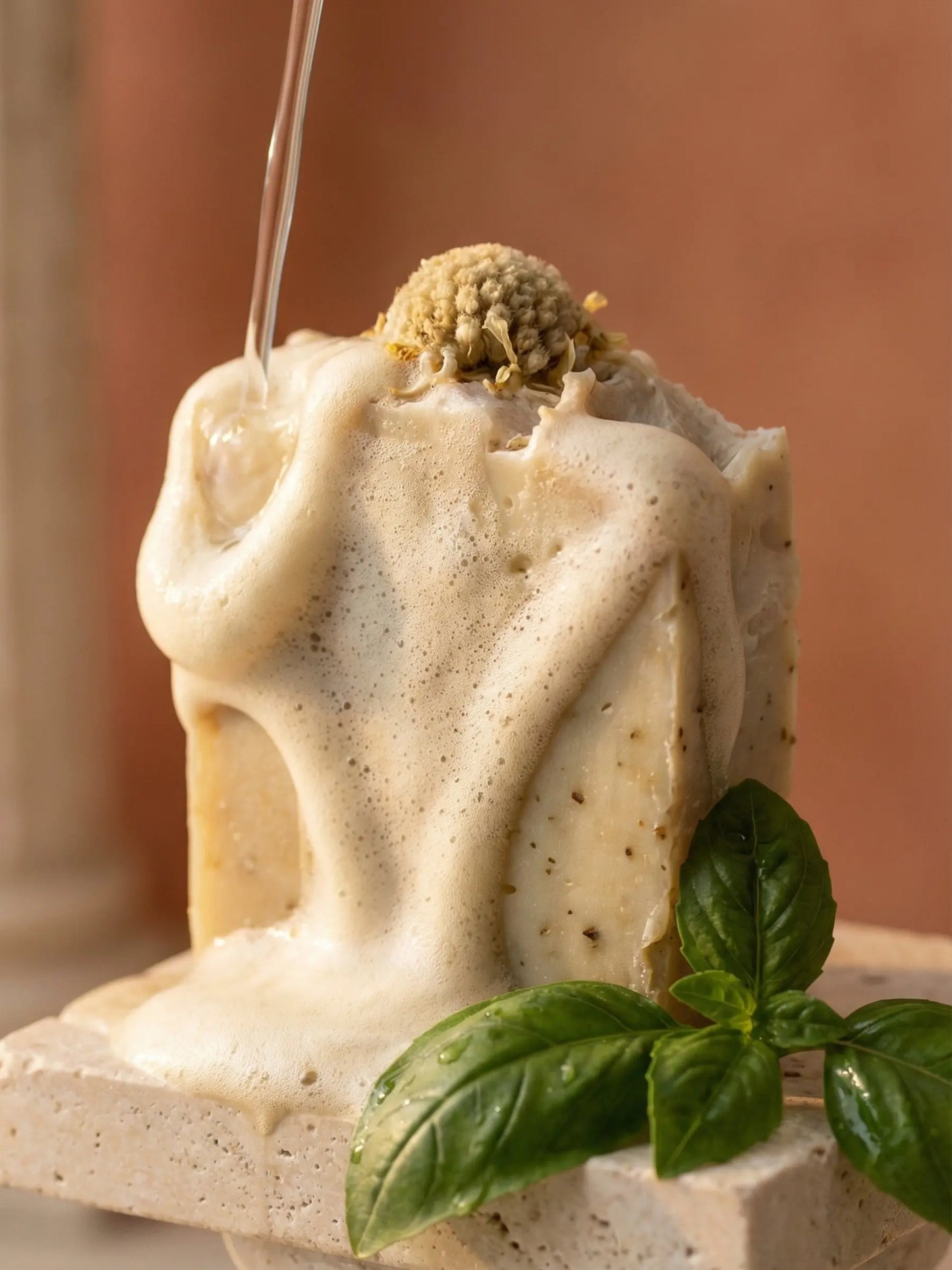 Basil soap with rich creamy lather under water stream, natural exfoliating olive oil soap for deep cleansing and smooth skin