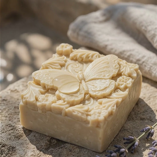 Natural lavender olive oil soap with detailed butterfly design, artisan handcrafted bar by DEOS CO.